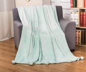 luxury plush pom pom throw